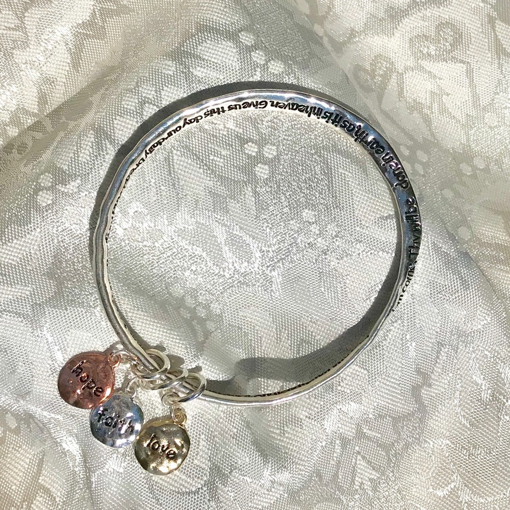 Silver bangle bracelet with charms